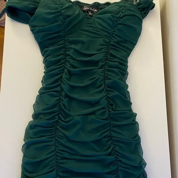 Green, ruffled, Crystal Doll dress size 9 in juniors.